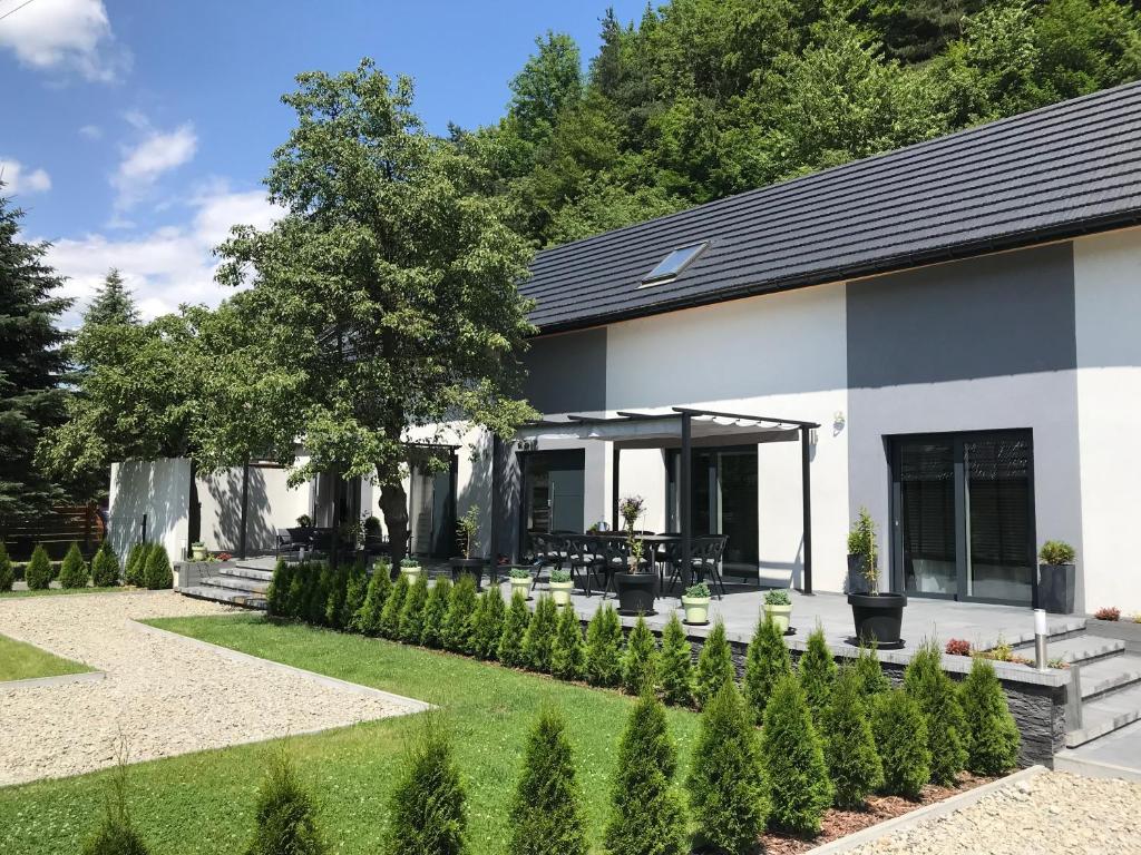 Vonkajšia záhrada v ubytovaní Domek szeregowy NR1