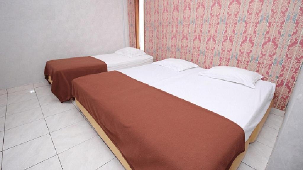 Orange Home Syariah - Triple Chambre