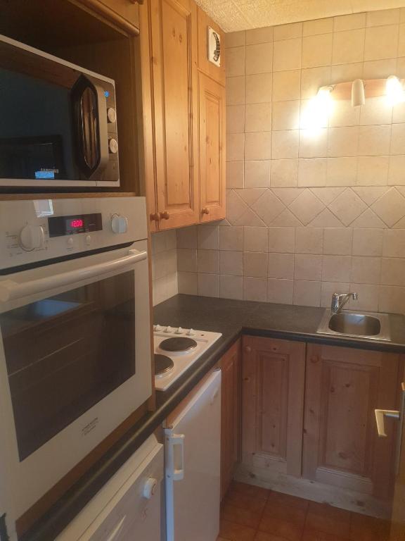 Kuchyň nebo kuchyňský kout v ubytování Olympic Appartements VTI