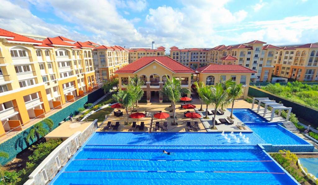 Ein Blick auf den Pool von der Unterkunft Cebu Dream Stay: 2BR Getaway oder aus der Nähe