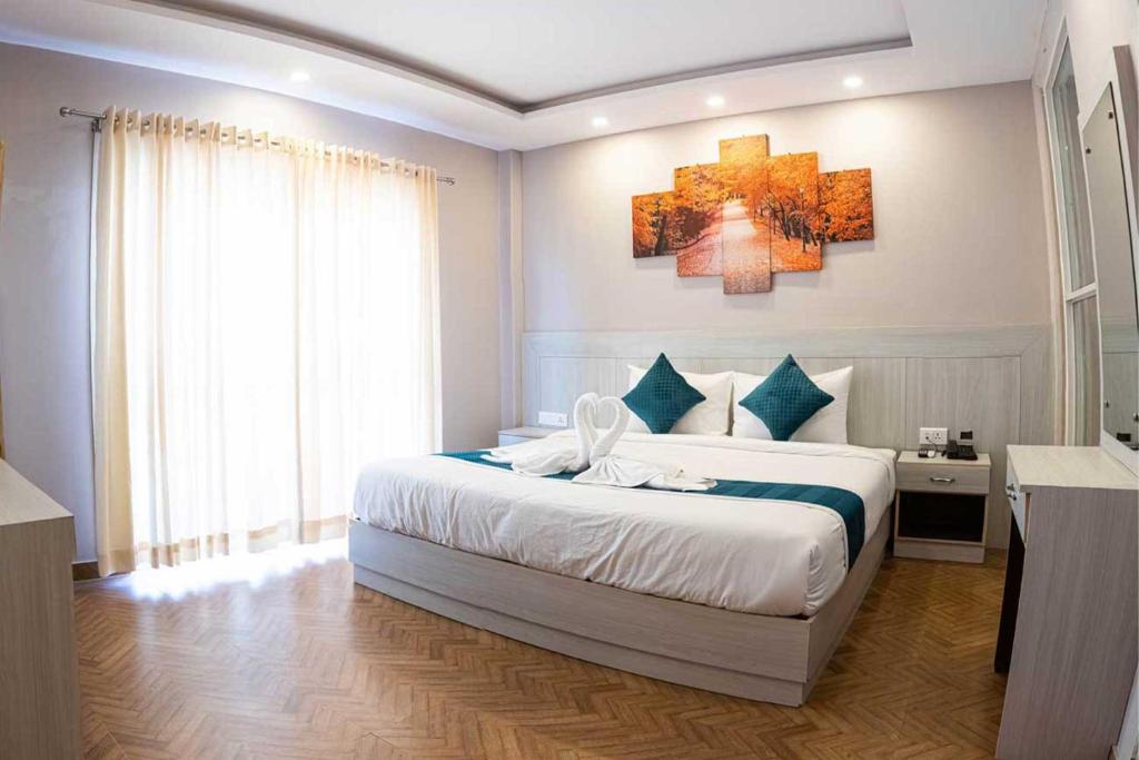 Postel nebo postele na pokoji v ubytování Majheri Resort and Spa