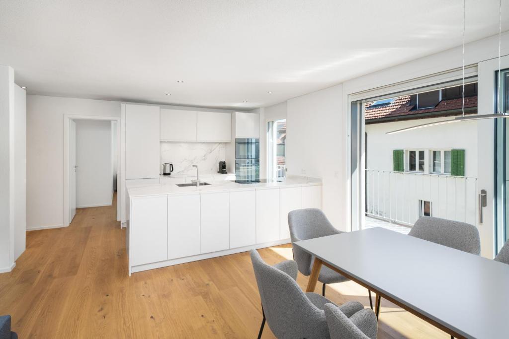 Kuchyň nebo kuchyňský kout v ubytování Neubauwohnung mit Lift in Matten