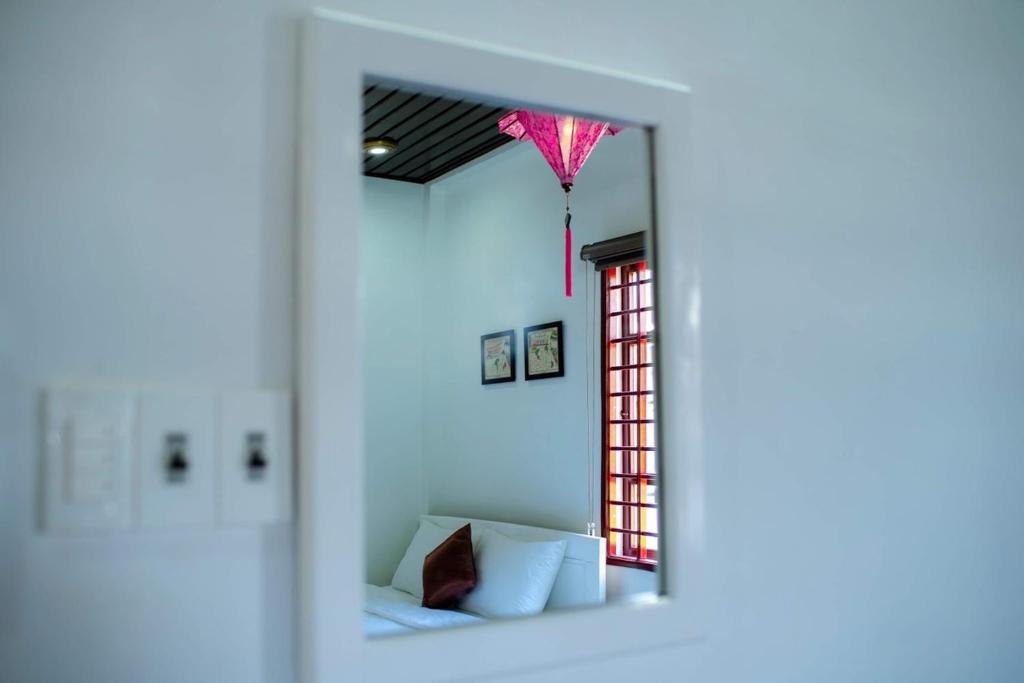 Giường trong phòng chung tại SEVEN HOMESTAY(HUE)