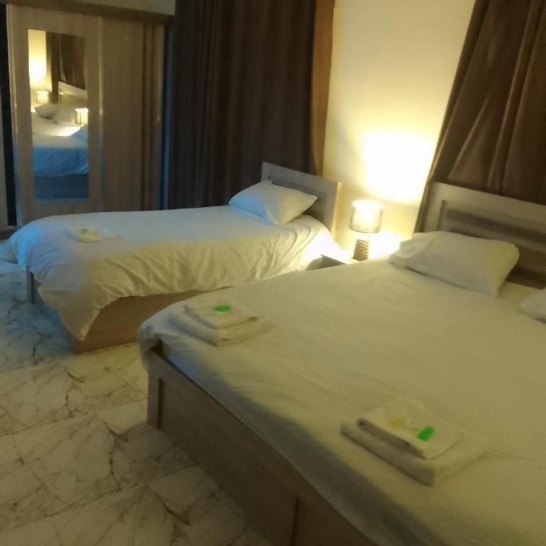 Postel nebo postele na pokoji v ubytování Dream house hotel jerash