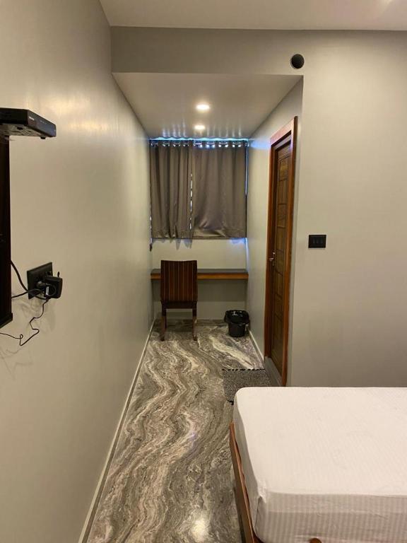 Postel nebo postele na pokoji v ubytování Luxe Inn