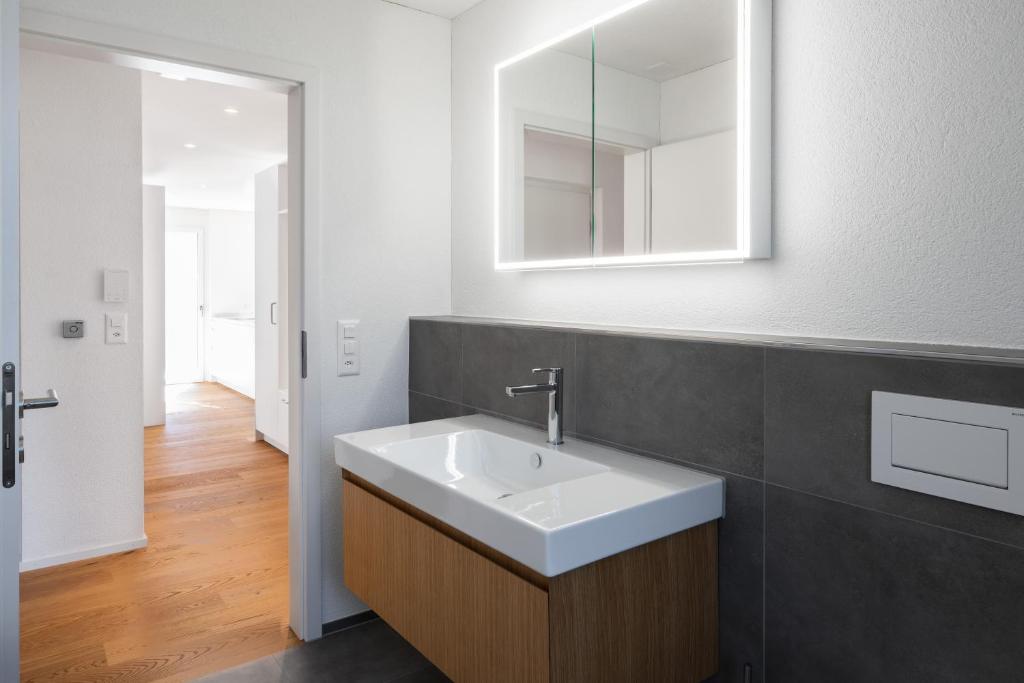 Koupelna v ubytování Neubauwohnung mit Lift in Matten