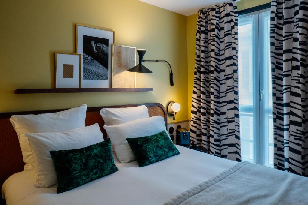 Postel nebo postele na pokoji v ubytování Hôtel Riesner
