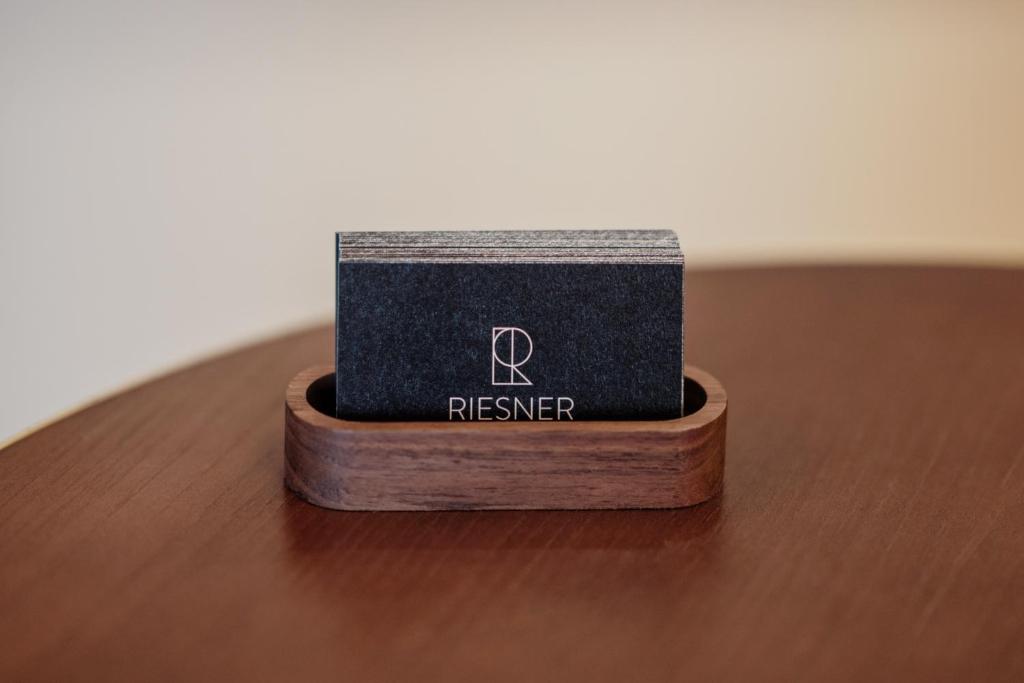 a wooden box sitting on top of a wooden table at Hôtel Riesner in Paris