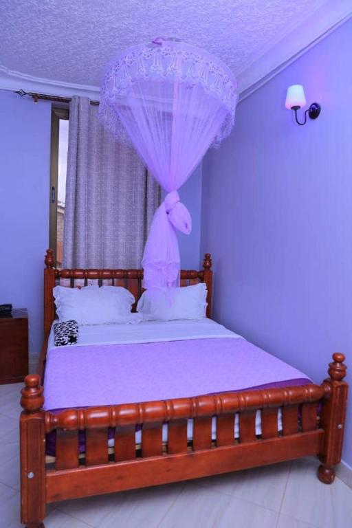 Postel nebo postele na pokoji v ubytování M3 Stella Hotel