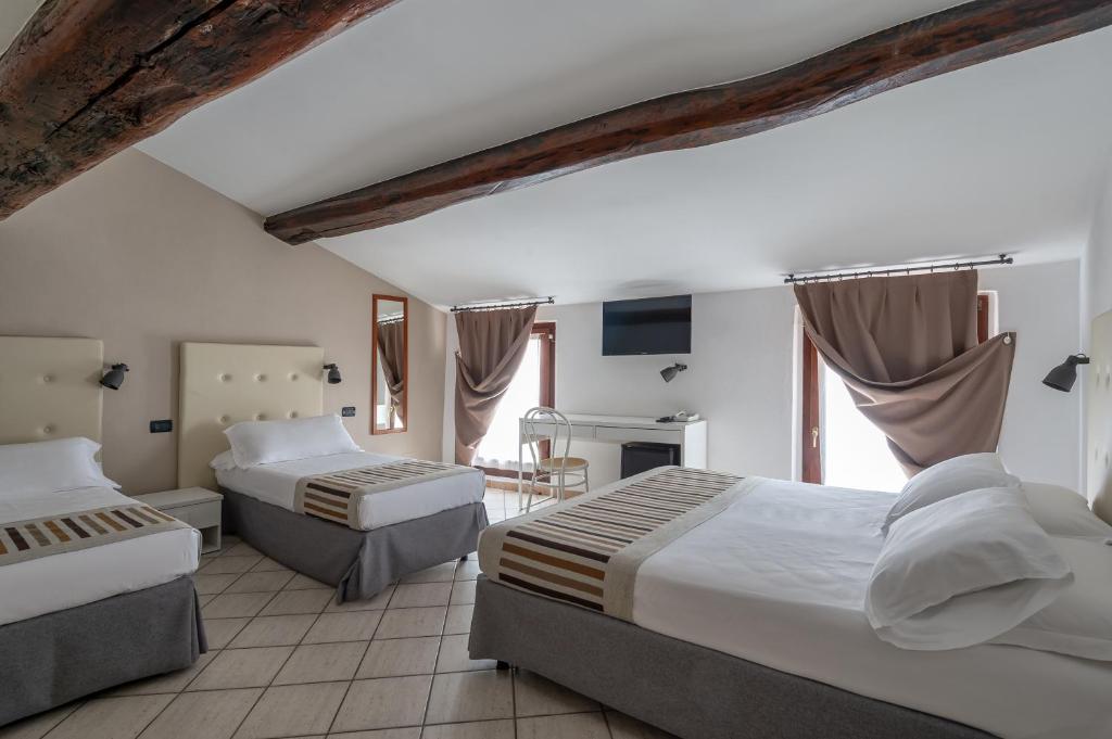 Letto o letti in una camera di Antico Residence