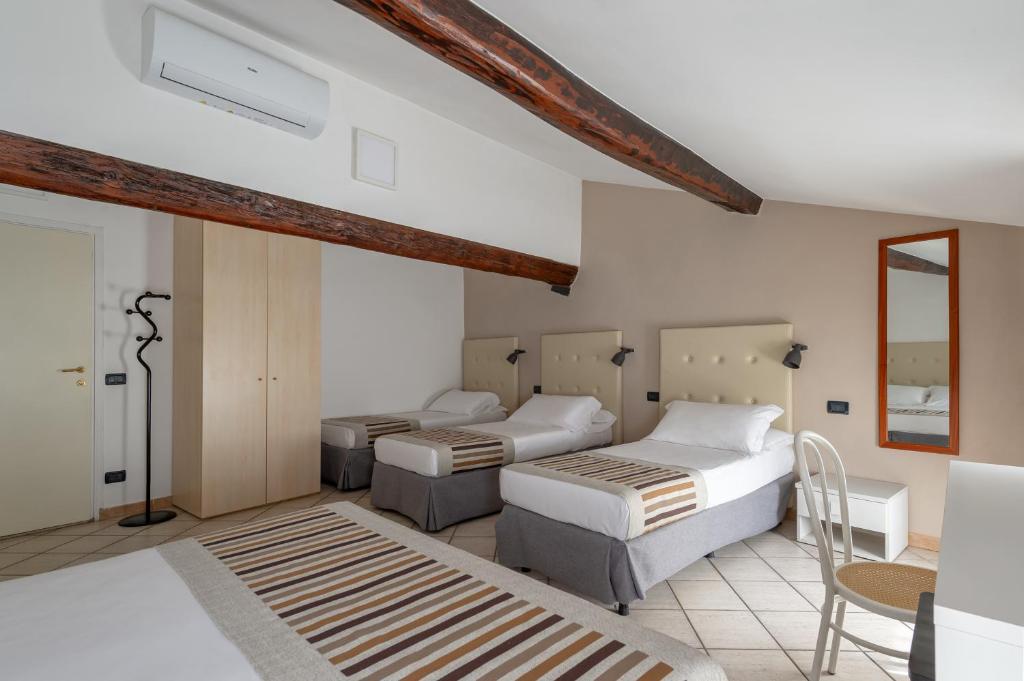 Letto o letti in una camera di Antico Residence