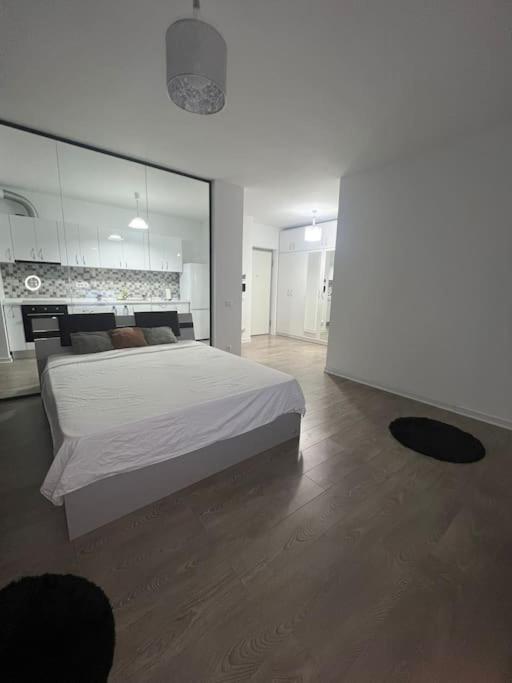 En eller flere senge i et værelse på Corporate One Room Pipera