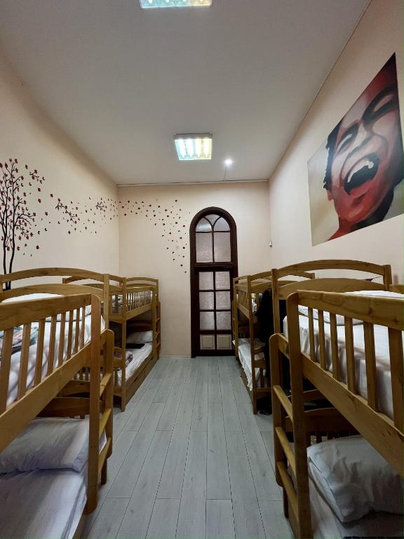 Letto o letti in una camera di Dja Hostel