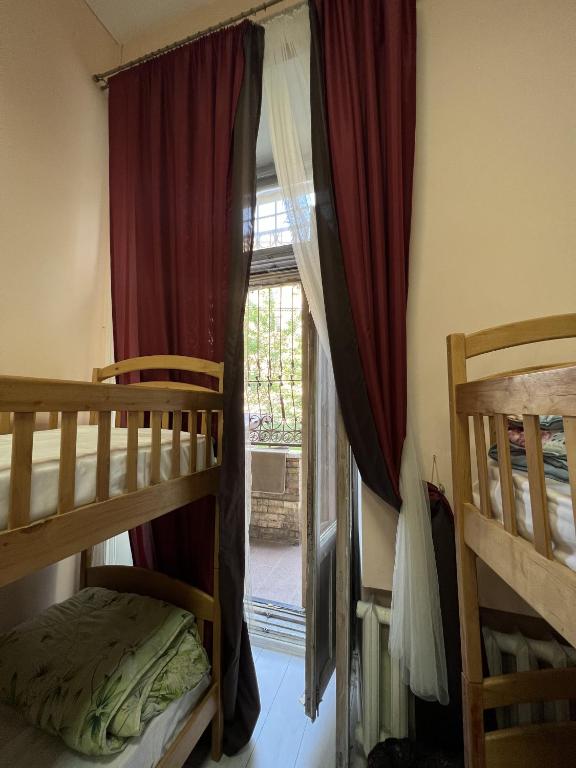 Letto o letti in una camera di Dja Hostel