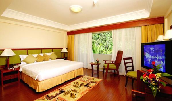 Giường trong phòng chung tại Kalim Resort - SHA Plus
