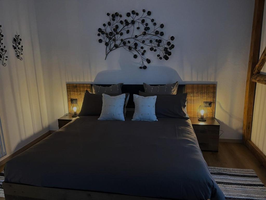 Łóżko lub łóżka w pokoju w obiekcie Casa Rodi