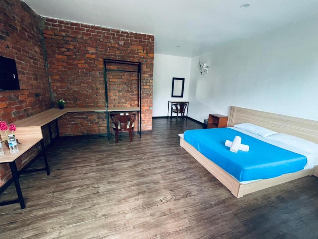 Postel nebo postele na pokoji v ubytování Big Dreams Garden Stay