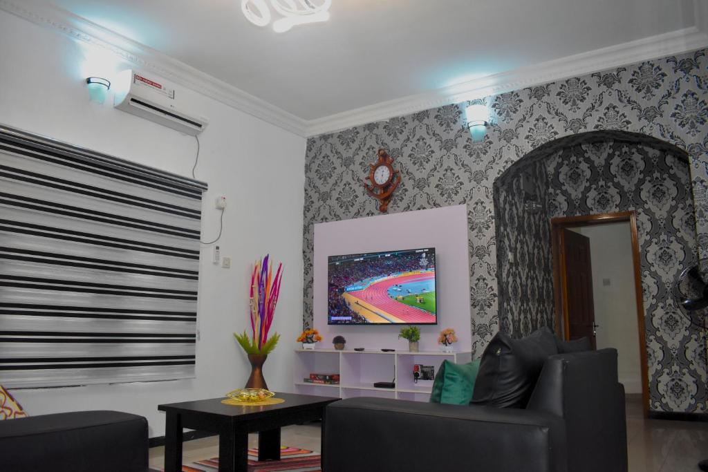 TV a/nebo společenská místnost v ubytování Rehoboth Homes