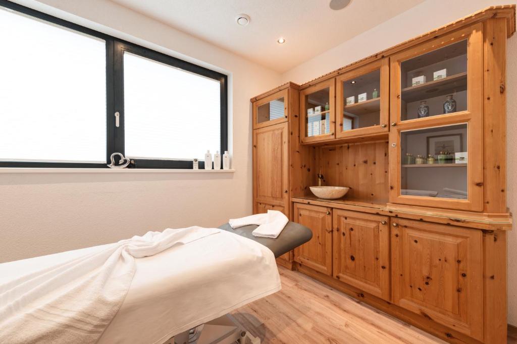 Postel nebo postele na pokoji v ubytování Hotel Alpenkönigin - Sommer Silvretta Premium Card inklusive