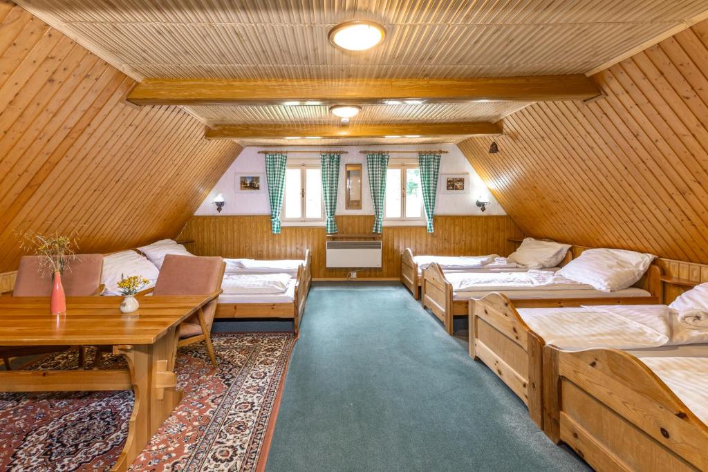 Postel nebo postele na pokoji v ubytování Chata Zvoneček