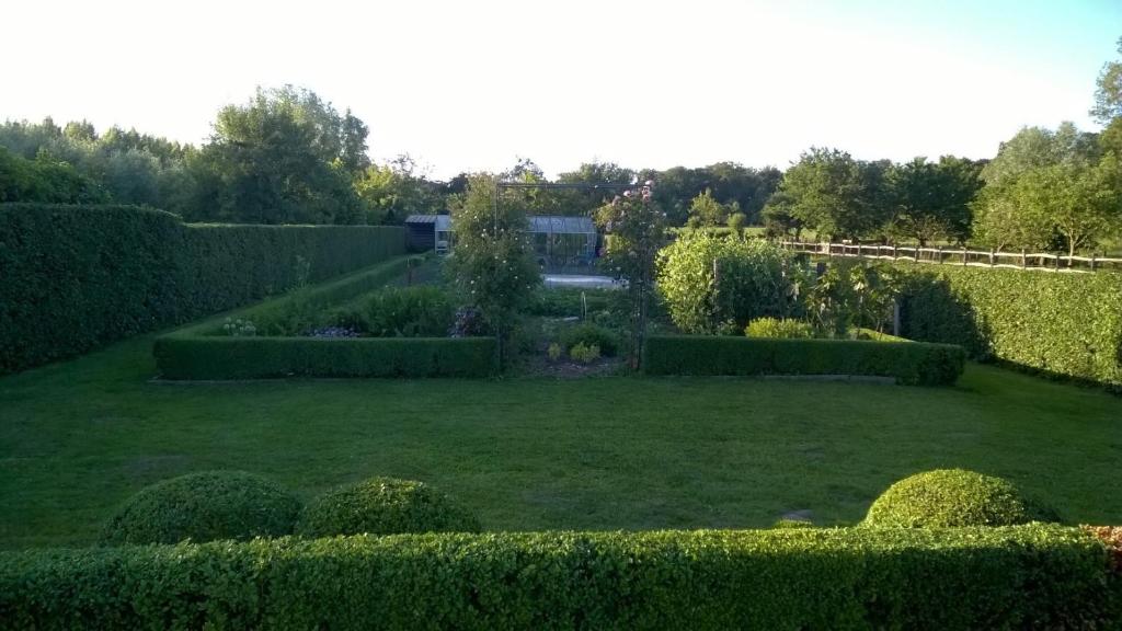 Zahrada ubytování B&B Hier en Nu
