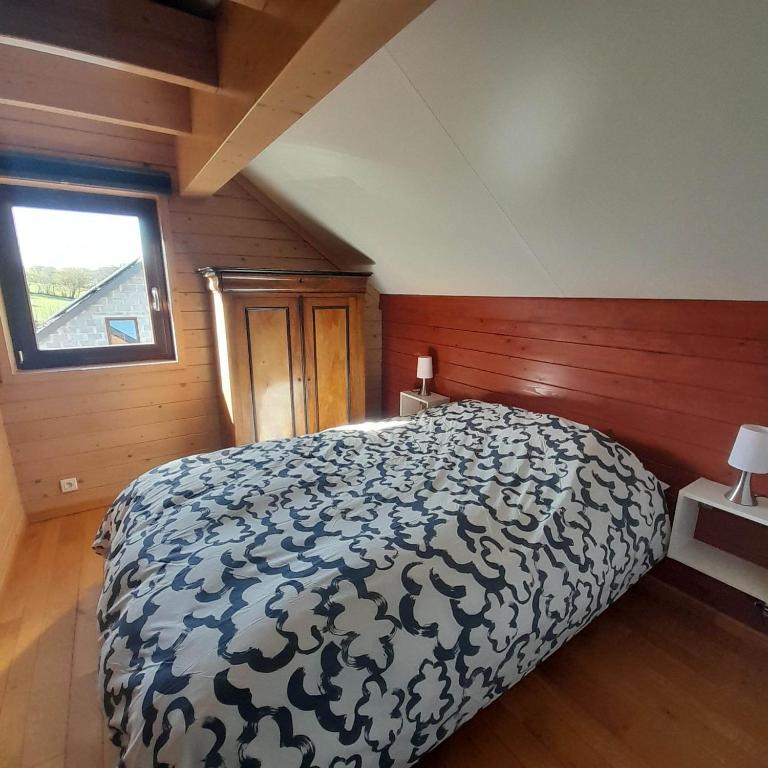 Postel nebo postele na pokoji v ubytování Le gîte Pierre et Bois