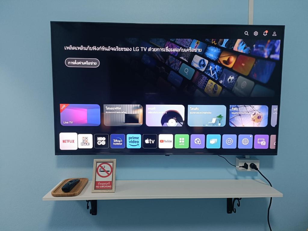 TV a/nebo společenská místnost v ubytování WORA Home HuaHin