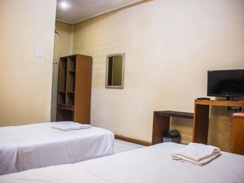 Krevet ili kreveti u jedinici u okviru objekta Hotel Sukamulya Pasteur