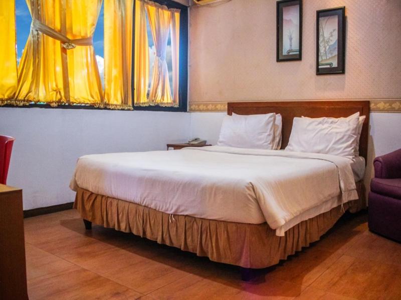 Krevet ili kreveti u jedinici u okviru objekta Hotel Sukamulya Pasteur