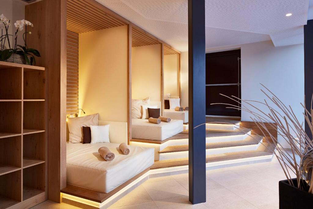 Postel nebo postele na pokoji v ubytování Preidlhof Luxury Dolce Vita Resort