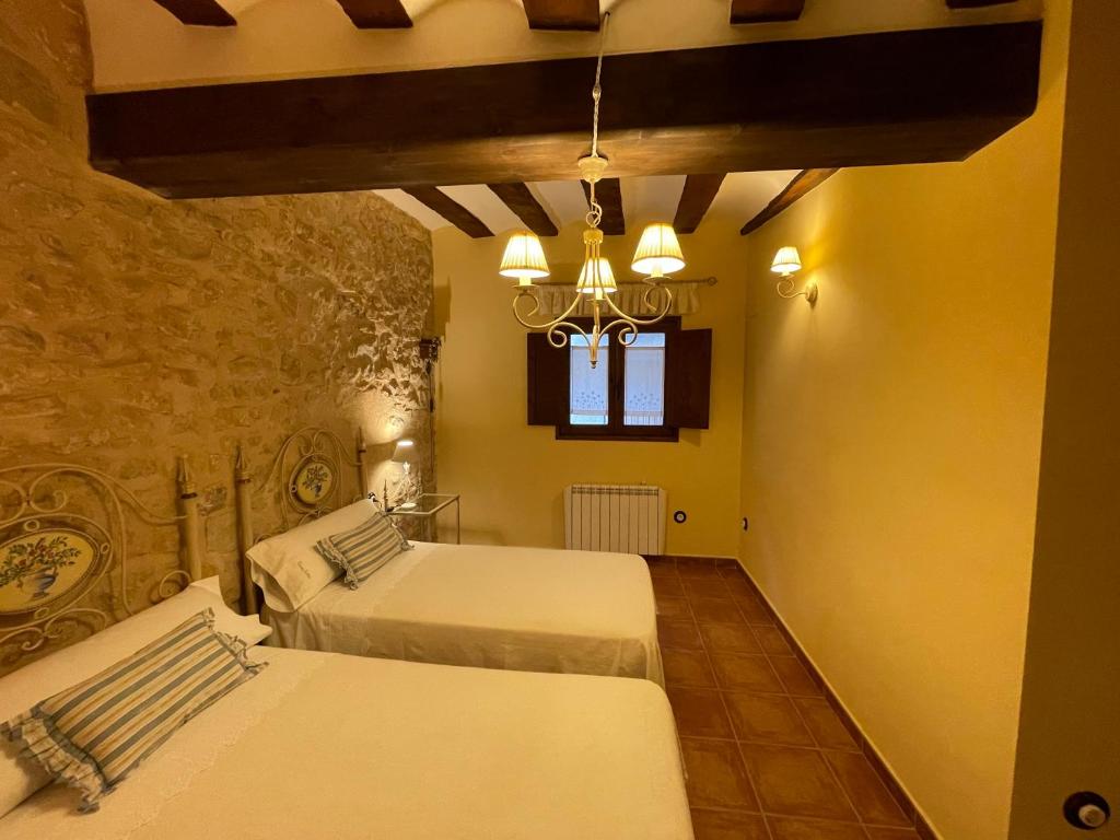 Postel nebo postele na pokoji v ubytování Casa Lidia - Antigua Posada Real
