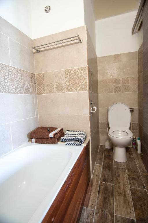 Koupelna v ubytování 1A - Chambres et Appartements au calme - Centre St Denis - Barachois