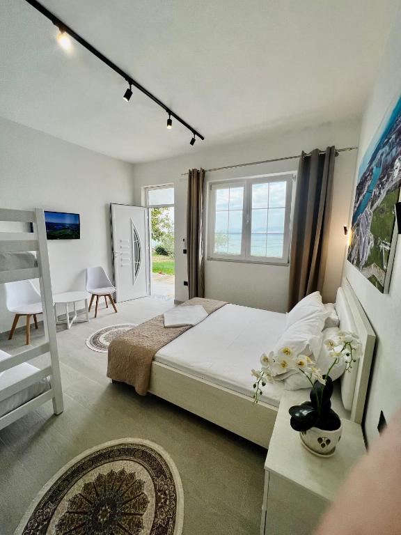 Postel nebo postele na pokoji v ubytování Iart Residence