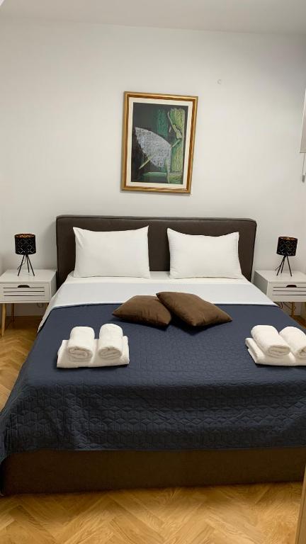 Ένα ή περισσότερα κρεβάτια σε δωμάτιο στο MM Split apartment - 5 min by car to the beach & city center - free public parking