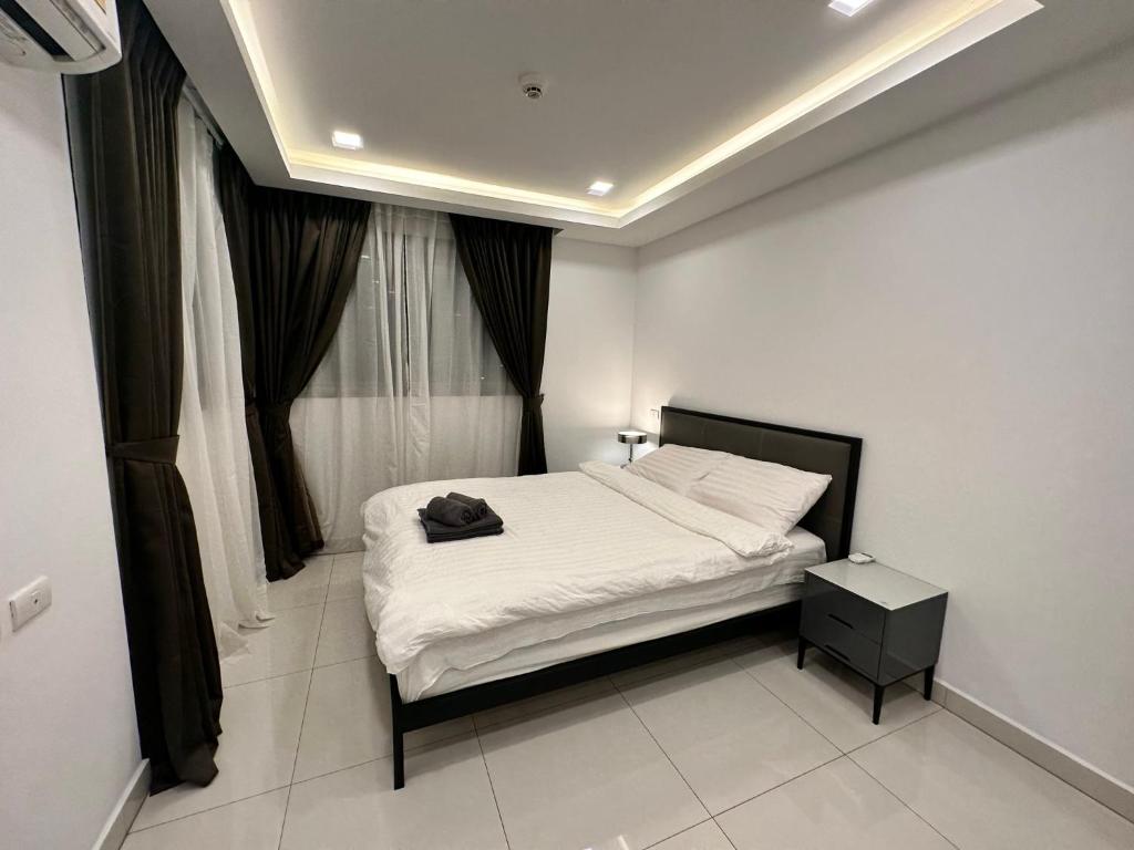 Fotografie z fotogalerie ubytování Exclusive Arcadia Condo - Amazing Pools & Gardens, Gym, Sauna, Waterfalls, Jacuzzi, Fast Internet v destinaci Pattaya South