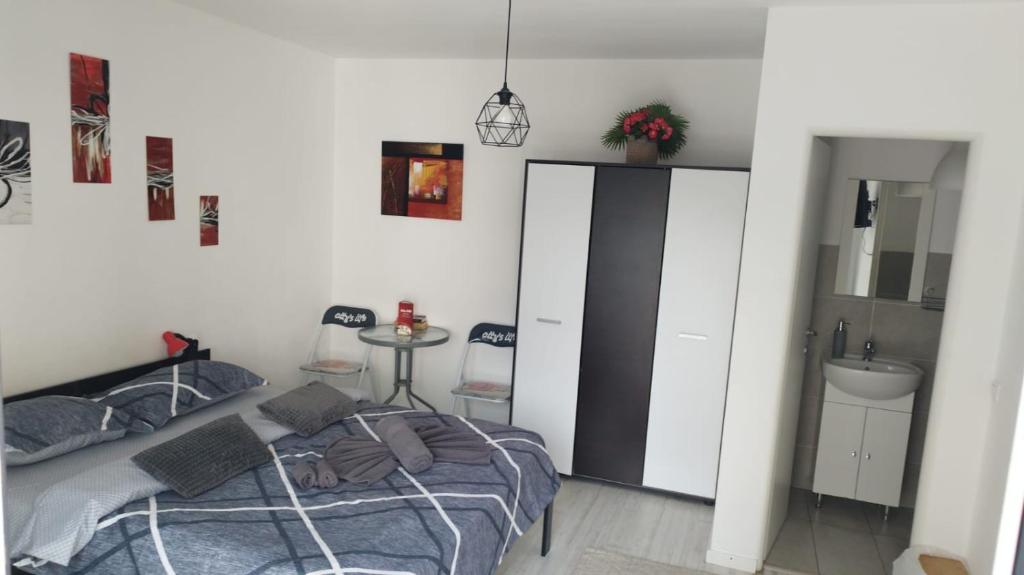 Postel nebo postele na pokoji v ubytování Vila ANA