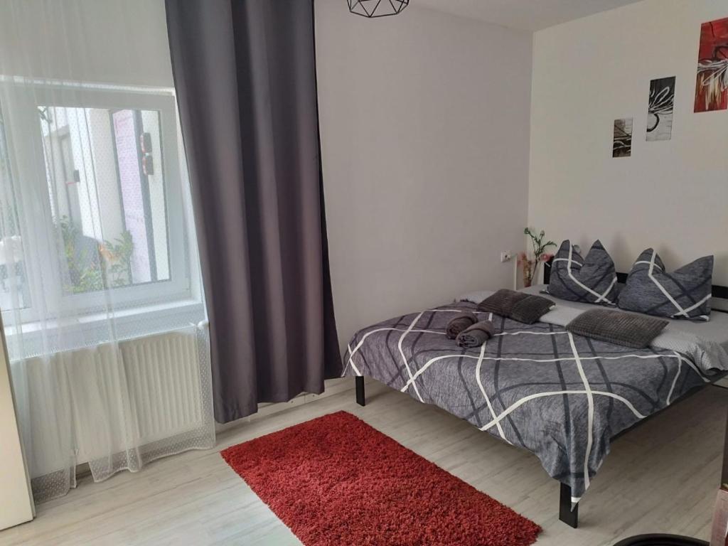 Postel nebo postele na pokoji v ubytování Vila ANA