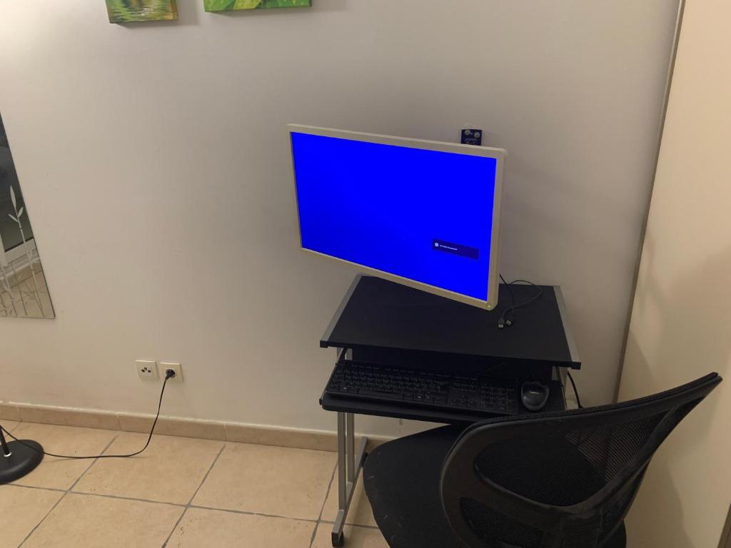 Televízia a/alebo spoločenská miestnosť v ubytovaní L'Odyssée, Appt 4 pers, parking privé, Wifi