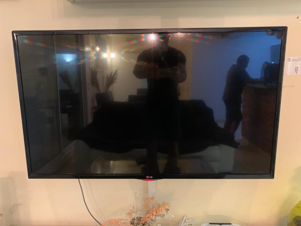 Televízia a/alebo spoločenská miestnosť v ubytovaní L'Odyssée, Appt 4 pers, parking privé, Wifi