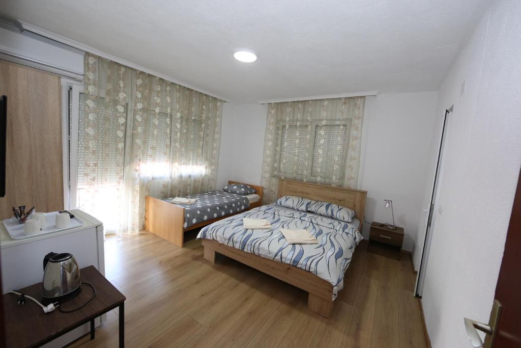 Postel nebo postele na pokoji v ubytování Villa Rita
