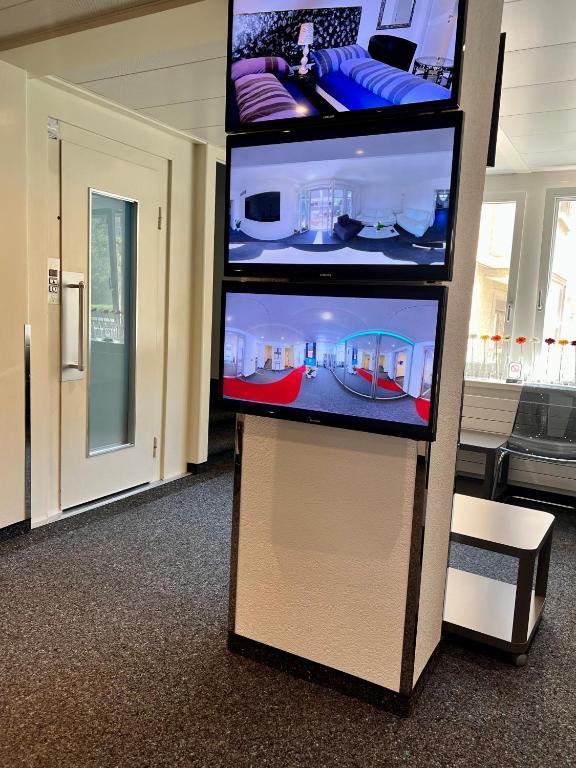 A television and/or entertainment centre at Seefeld Residenz