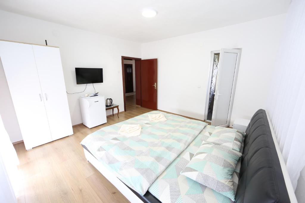 Postel nebo postele na pokoji v ubytování Villa Rita