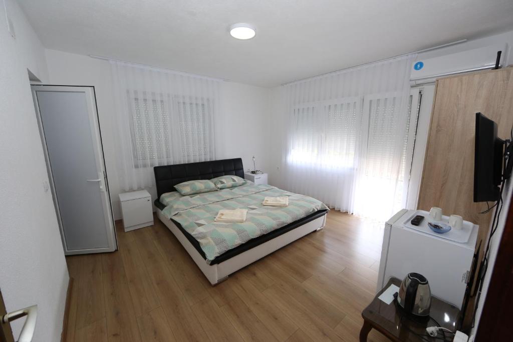 Postel nebo postele na pokoji v ubytování Villa Rita