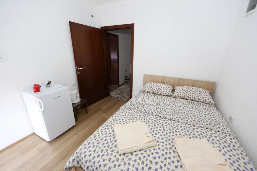Postel nebo postele na pokoji v ubytování Villa Rita