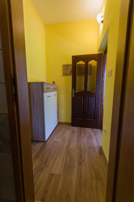 Kuchyň nebo kuchyňský kout v ubytování Apartment and Room Natasa