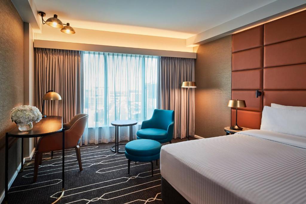 Postelja oz. postelje v sobi nastanitve Holiday Inn Sydney Airport, an IHG Hotel