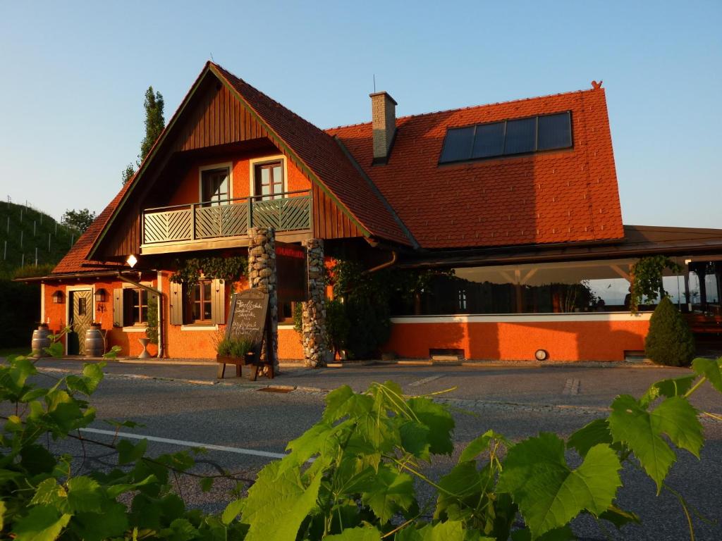 a building with a sign in front of it at Wohlmuth-Lückl in Kitzeck im Sausal