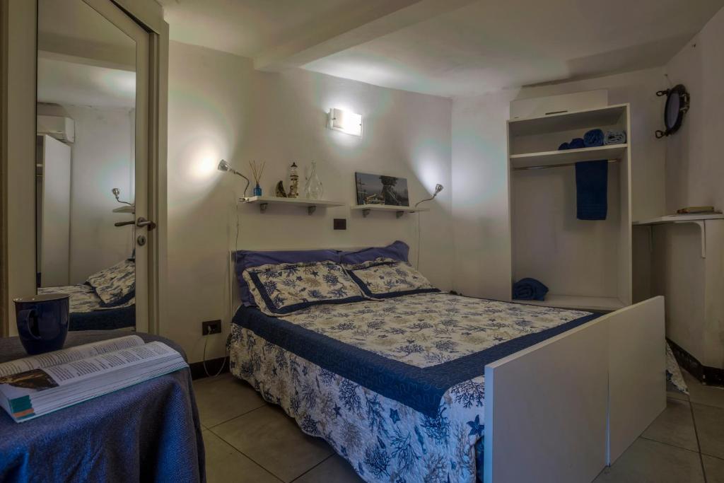 Postel nebo postele na pokoji v ubytování Lisetta Rooms