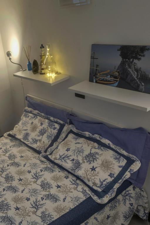 Postel nebo postele na pokoji v ubytování Lisetta Rooms