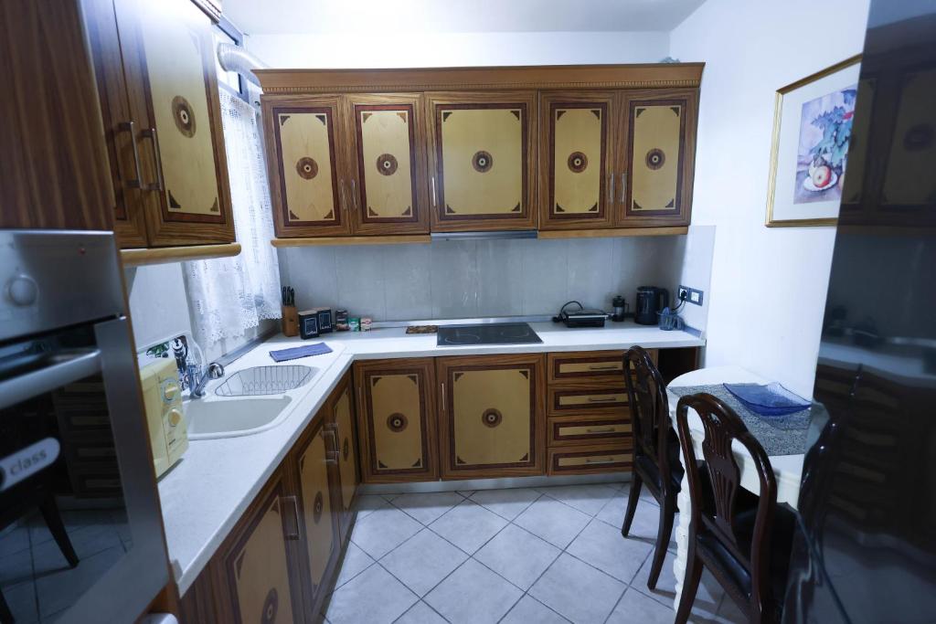 Kuchyň nebo kuchyňský kout v ubytování Royal House